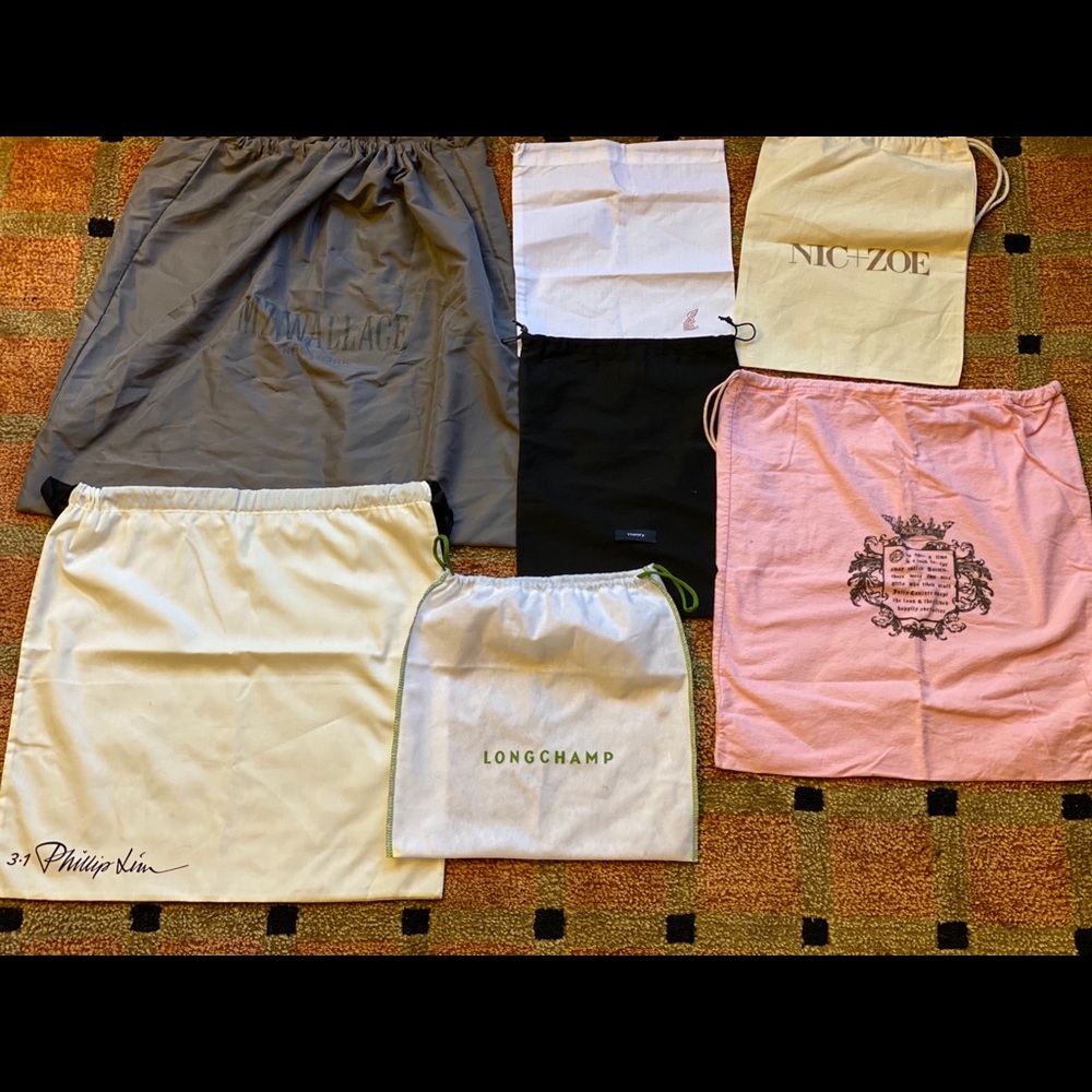 Collection of 7 designer dust bags